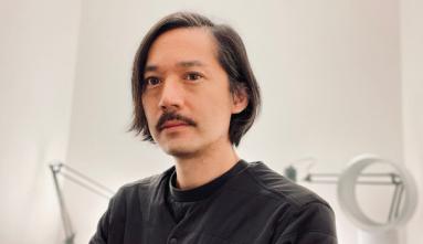 Headshot of curator Howie Chen.